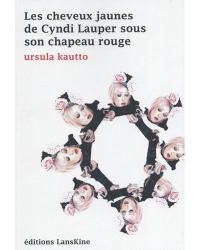 Les cheveux jaunes de Cindy Lauper sous son chapeau rouge